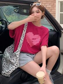 DAZY Camiseta informal de mujer de manga corta con cuello redondo holgada y estampado de corazones, camisetas gráficas