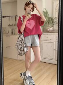 DAZY Camiseta informal de mujer de manga corta con cuello redondo holgada y estampado de corazones, camisetas gráficas