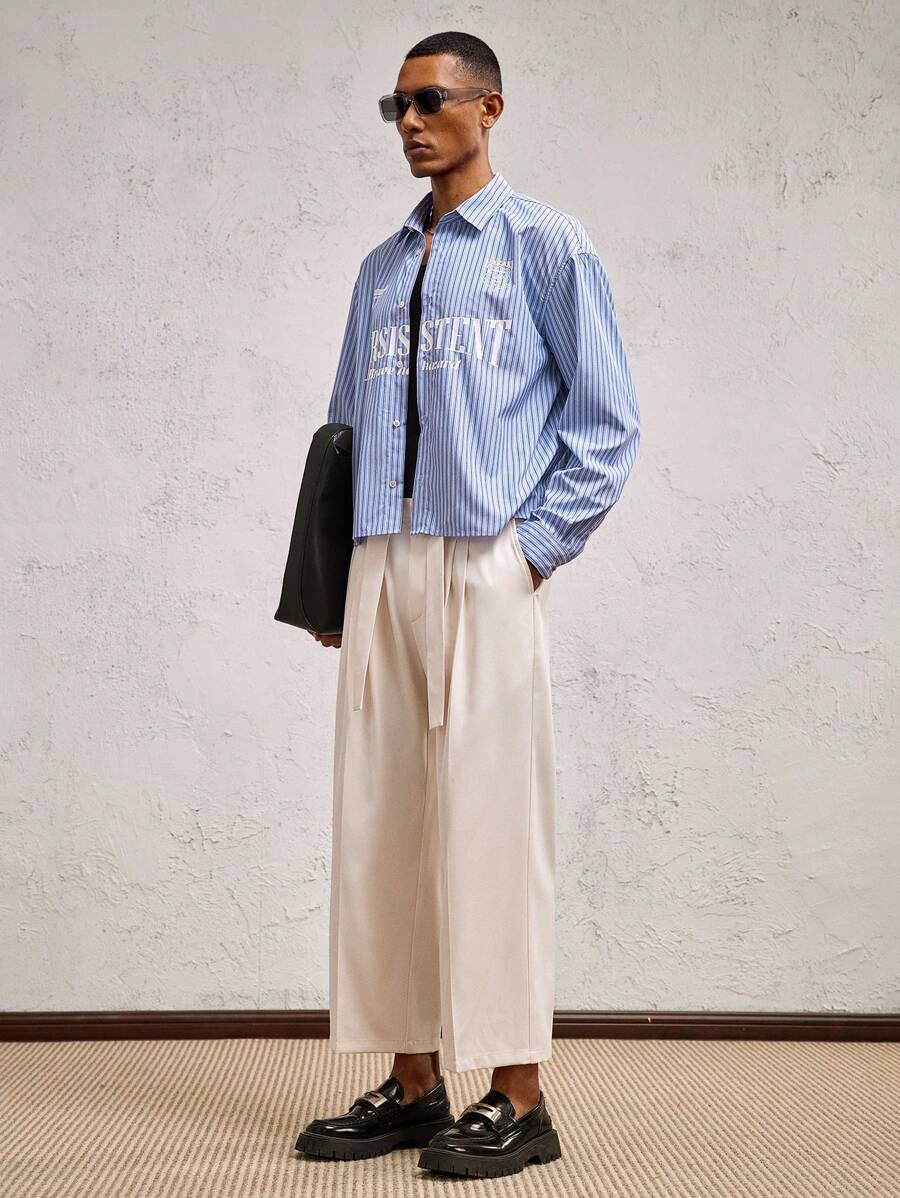 SHEIN X ELOISA & ORSON AKNOTIC Party 男士宽松字母条纹印花翻领长袖休闲衬衫，适合日常穿着 - 藍色 - 查看 1