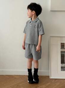 DAZY Conjunto de 2 piezas para niños pequeños, camisa tipo polo de manga corta y unicolor, y shorts