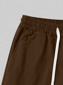 Manfinity Homme Shorts casuales sueltos de talla grande para hombre con cintura con cordón de unicolor