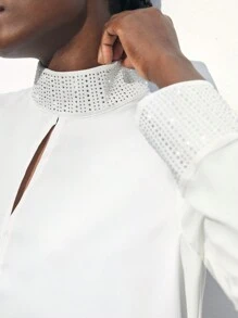 Maija بلوزة أنيقة بأكمام طويلة فضفاضة لحفلات المناسبات مزينة بالراين ستون والتقسيمات المفرغة في الياقة والأساور ، بتصميم أبيض مناسب لفصل الربيع المبكر / الربيع ، تصميم عملي وأنيق للحفلات الحضرية - أبيض - مشاهدة 2