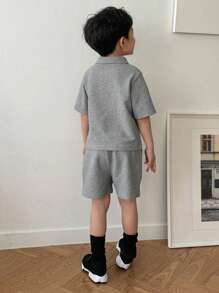DAZY Conjunto de 2 piezas para niños pequeños, camisa tipo polo de manga corta y unicolor, y shorts