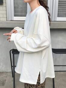 FRIFUL Camiseta básica larga de manga larga con cuello redondo, bajo dividido y corte oversize en color blanco, para primavera