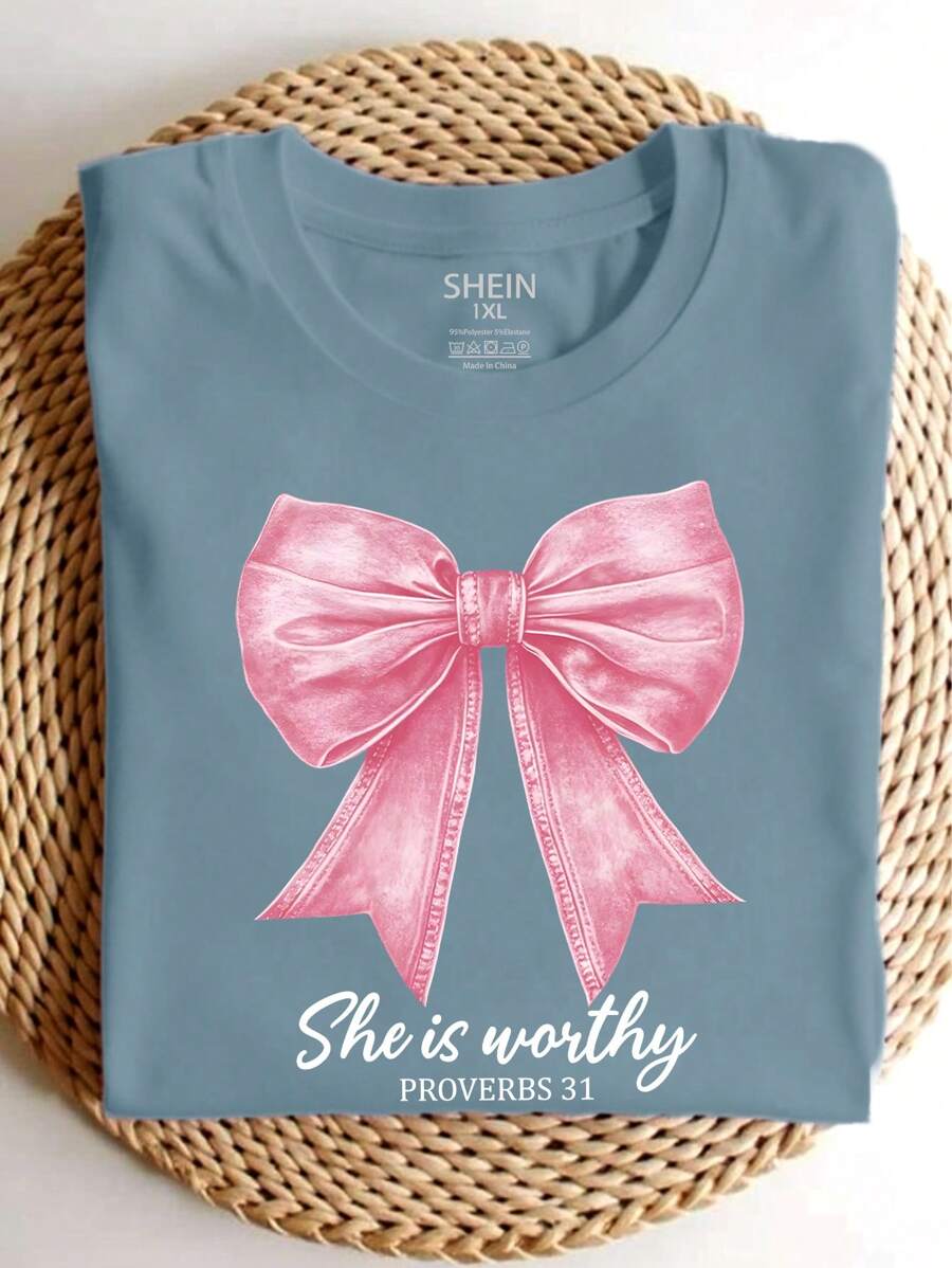 Calvaya Plus Size Women's Tops Pink Bow Faith Letter 'she Is Worthy' Slogan Graphic Print Round Neck T-Shirt, For Summer