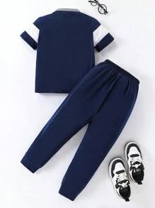 SHEIN Playful Pals Young Boy 2 Pieces Set: Colorblock Letter Graphic Print Polo Shirt & Navy Blue Pants, Casual School Style Perfect For Spring, Autumn And Summer Everyday Wear