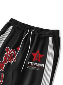 Manfinity EMRG Men's Black Y2K Sweatpants With Reflective Stripes And Graphic Print - Black - View 2