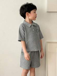 DAZY Conjunto de 2 piezas para niños pequeños, camisa tipo polo de manga corta y unicolor, y shorts