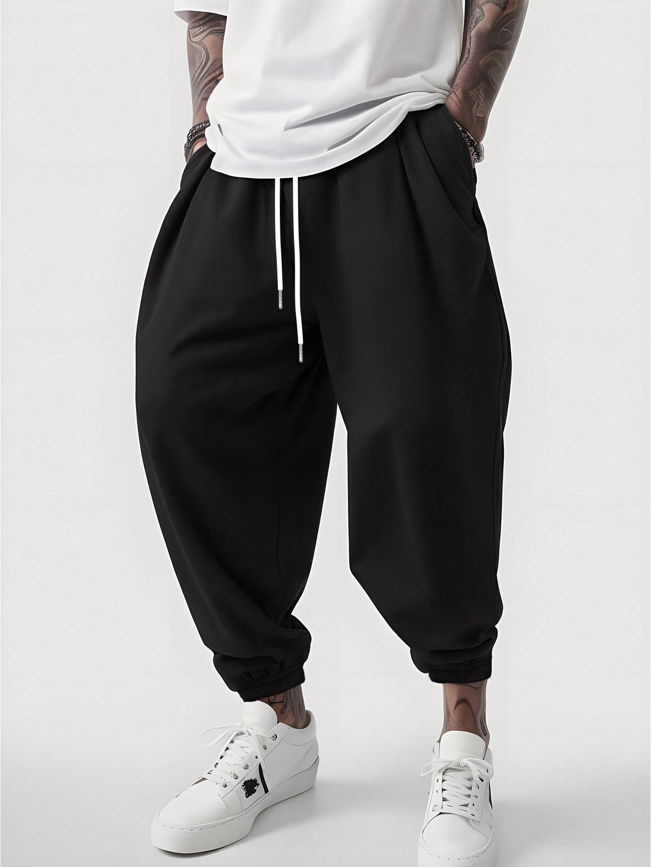 Manfinity Dauomo Men's Drawstring Waist Pockets Harem Loose Casual Pants , Baggy Pants