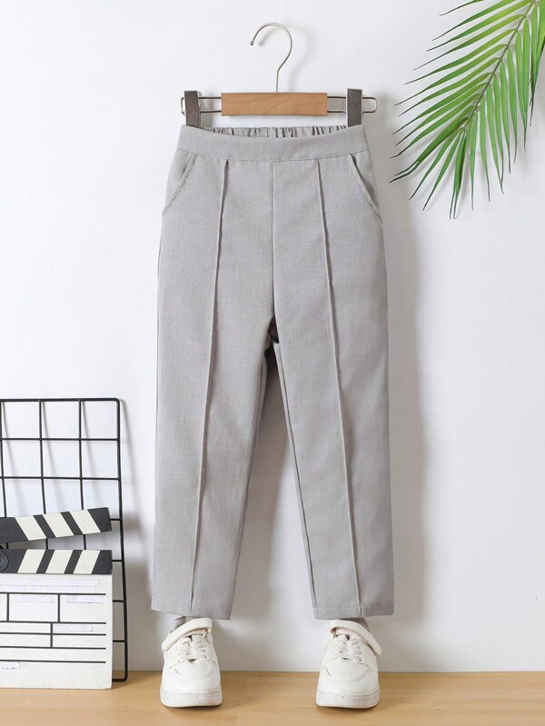 SHEIN Casual effen jongensbroek met schuine zakken en rechte pijpen, geweven. Deze broek straalt niet alleen vitaliteit uit op school, maar is ook comfortabel en relaxed om thuis te dragen. Deze geweven broek is niet alleen veelzijdig, maar ook modieus en leuk.