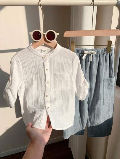 SHEIN 2pcs/Set Young Boys Casual Sports Vacation Clean Color White Polo Shirt & Elastic Waist Pocket Solid Color Pants, Suitable For Kids Outfits, Young Boy Clothes, Back To School, Boys Set For Birthday Parties, Evening Parties, Performances, Weddings, Valentine's Day, Suitable For Daily Use, School, Travel, Sports, Spring And Summer Seasons