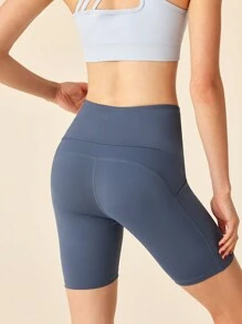 SHEIN Sports Short de entrenamiento de cintura alta sin costuras de unicolor para mujer