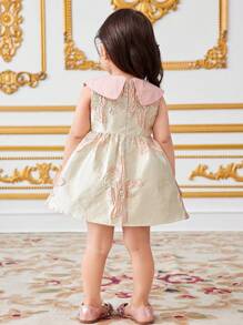 SHEIN Robe décontractée ajustée de luxe et élégante pour bébé fille avec un style patchwork et des blocs de couleurs sur le col sans manches