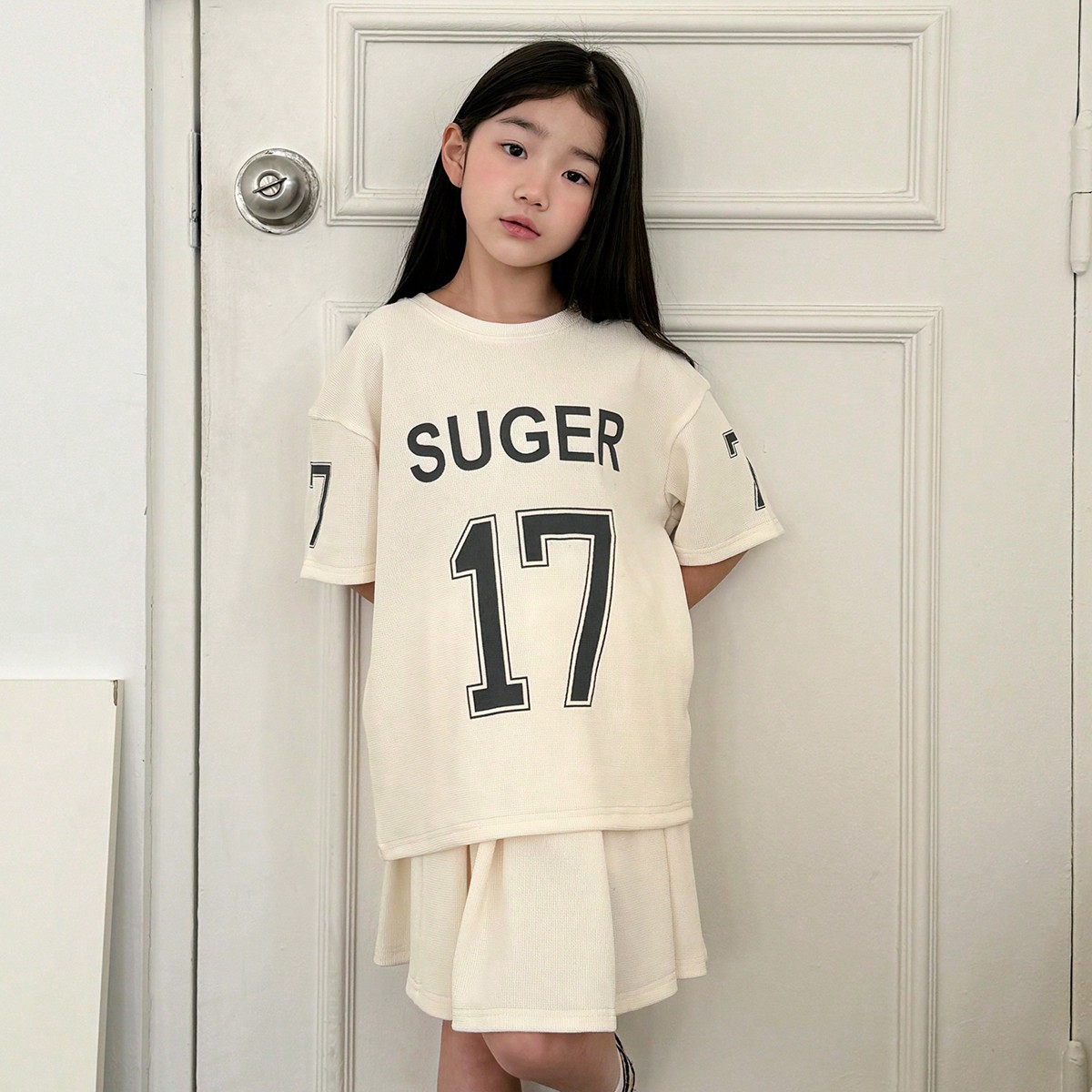 Set de 2 piezas para niña preadolescente que incluye blusa de manga corta con cuello redondo y estampado de letras, y falda informal. Conjunto de rop