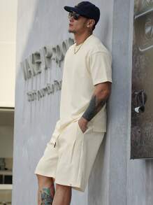 DAZY Conjunto de top de manga corta de cuello redondo y pantalones cortos casuales para hombre en verano