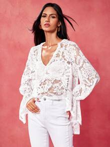 Oxana Blusa holgada de mujer con escote en V de encaje transparente, bajo asimétrico, estilo bohemio, ideal para verano, salidas, festivales, playa, conciertos, vacaciones, uso casual y de oficina, estilo occidental, boho, ropa de calle