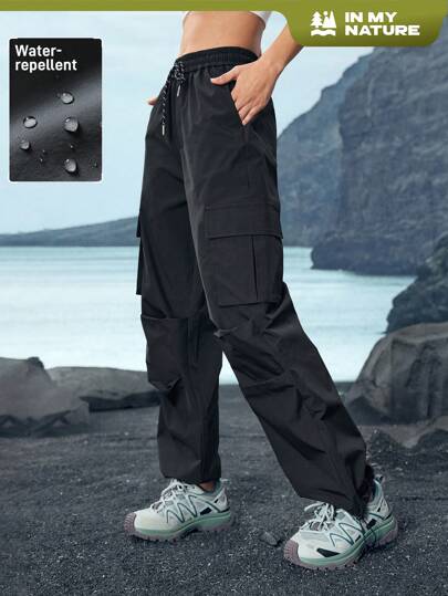 Pantalones cargo casuales de mujer con bolsillo, cordón y amarre delantero de unicolor para uso al aire libre