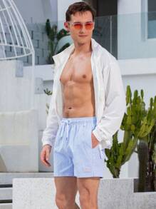 Manfinity Swimmode Shorts casuales de playa con bolsillo y atadura delantera a rayas para hombres
