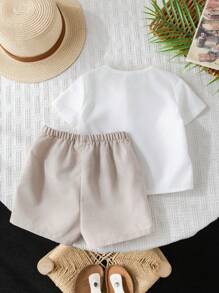 SHEIN 2pcs/Set Infant/Toddler Chest-Pocket Round Neck Short Sleeve Pullover Top And Solid Shorts Set, Suitable For Spring And Summer Everyday Wear - Khaki - View 2