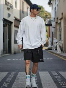 DAZY Men's Letter Print Athletic Shorts With Lining - Black - View 5