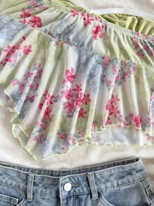 Soleia Kwiatowy nadruk, modny top typu bandeau, wiązany u dołu, asymetryczny dół, damski top, wiosna