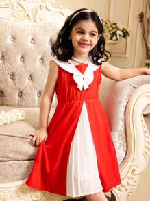SHEIN Vestido informal suelto con cuello en V y parches de pliegues con decoración de lazo, que resalta la vitalidad juvenil, la inocencia adorable, el estilo personalizado y el entusiasmo dulce, perfecto para uso diario y fiestas, prenda esencial de primavera/verano y regalo de ropa para niñas jóvenes