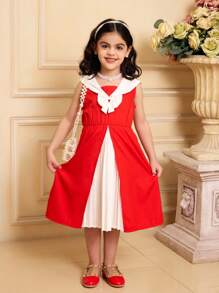 SHEIN Vestido informal suelto con cuello en V y parches de pliegues con decoración de lazo, que resalta la vitalidad juvenil, la inocencia adorable, el estilo personalizado y el entusiasmo dulce, perfecto para uso diario y fiestas, prenda esencial de primavera/verano y regalo de ropa para niñas jóvenes