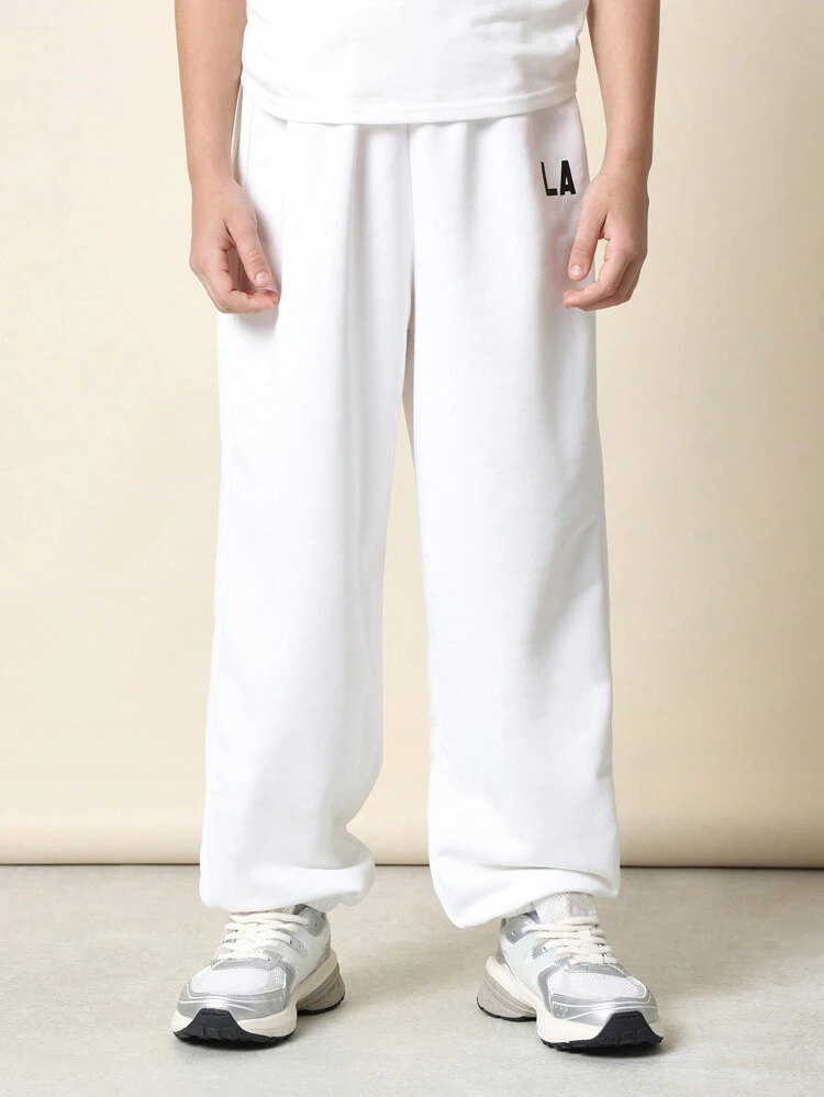 Pantaloni della tuta da jogging casual da città ricamati con elastico in vita