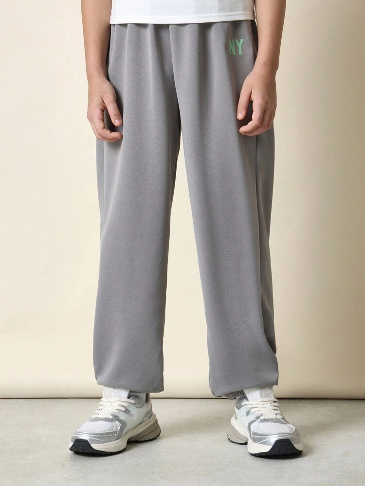 Pantaloni della tuta da jogging casual da città ricamati con elastico in vita
