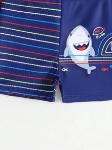 Conjunto de bañador para niño pequeño con parte superior de manga corta de cuello redondo y unicolor, y pantalón corto