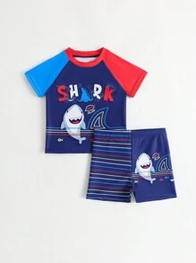 Conjunto de bañador para niño pequeño con parte superior de manga corta de cuello redondo y unicolor, y pantalón corto
