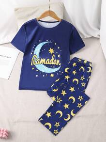 SHEIN Set de 2 prendas de pijama para adolescentes, que incluye top de manga corta con estampado minimalista de estrellas y luna, y pantalón largo, para festivales - azul real - Ver 1