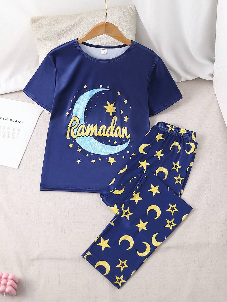SHEIN Set de 2 prendas de pijama para adolescentes, que incluye top de manga corta con estampado minimalista de estrellas y luna, y pantalón largo, para festivales - azul real - Ver 1