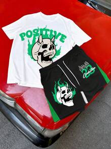 Manfinity EMRG 男士年轻街头风格 INS 商品白色圆领 T 恤和黑色短裤套装，火焰骷髅和数字 23 街头图案，绿黑配色。男士两件套服装，绿色图案 T 恤，超大图案 T 恤