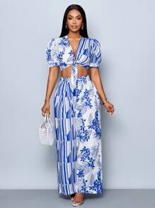 SOLERSUN Conjunto de 2 piezas de verano y primavera para mujer con blusa de manga abullonada, escote en V profundo con nudo al frente y pantalón recto plisado de cintura elástica, con estampado floral sobre fondo blanco, para paseos y vacaciones