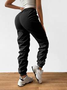 BamGleam 彈性口袋和折褶口袋的女式筆型褲 - 黑色 - 查看 2