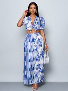 SOLERSUN Conjunto de 2 piezas de verano y primavera para mujer con blusa de manga abullonada, escote en V profundo con nudo al frente y pantalón recto plisado de cintura elástica, con estampado floral sobre fondo blanco, para paseos y vacaciones