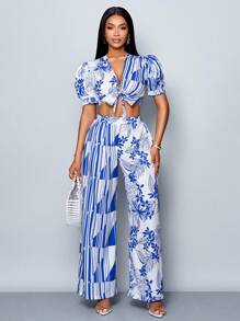 SOLERSUN Conjunto de 2 piezas de verano y primavera para mujer con blusa de manga abullonada, escote en V profundo con nudo al frente y pantalón recto plisado de cintura elástica, con estampado floral sobre fondo blanco, para paseos y vacaciones