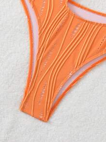 Swim SXY Maillot de bain une pièce sexy pour femmes Springbreak, à bretelles fines, avec texture orange et découpes. Idéal pour l'été et les vacances à la plage