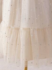 Glamorique Kids Vestido de princesa con estampado de estrellas y lunas para niña preadolescente, adecuado para festivales, reuniones familiares y salidas casuales. El diseño único con estampado de estrellas y lunas y la falda voluminosa de tul hacen que este vestido sea a la vez soñador y juguetón.
