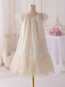 Glamorique Kids Vestido de princesa con estampado de estrellas y lunas para niña preadolescente, adecuado para festivales, reuniones familiares y salidas casuales. El diseño único con estampado de estrellas y lunas y la falda voluminosa de tul hacen que este vestido sea a la vez soñador y juguetón.