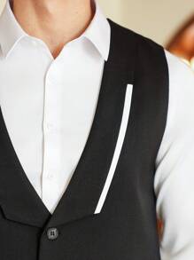Manfinity Mode Men's Business Attire, Featuring A Formal And Elegant Style With A Classic Black Suit Vest. The Vest Showcases An Asymmetrical White Color-Block Design On The Front Lapel, Adding A Stylish Touch And Enhancing Sophistication. It Makes An Excellent Gift Idea For Boyfriends Or Husbands And Is Suitable For Daily Commuting, Banquets, And Other Formal Occasions. Prom Suits For Men Wedding Outfit For Men Wedding Suits For Men