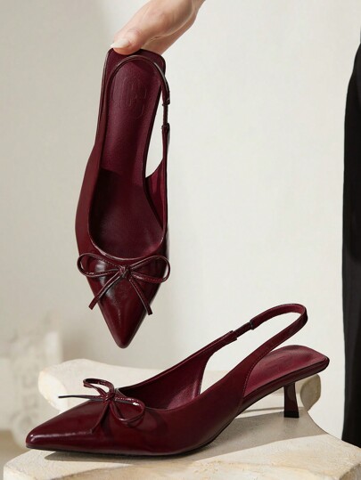 CUCCOO CHICEST Tacones altos de mujer con punta afilada, tacón de aguja y lazo en color burdeos. Elegante estilo vintage para ocasiones formales