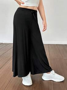 SHEIN Pantalones casuales sueltos y de un solo color de punto para niña
