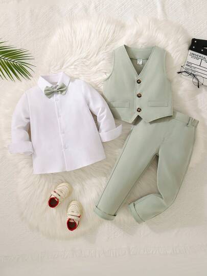 SHEIN Gentleman 3-Piece Suit For Young Boys, Includes Elegant Bow Tie, White Collar Shirt, Vest And Casual Suit Pants. Fashionable Gentlemen's Outfit Suitable For Daily Casual Wear, Birthday Parties, Weddings, Halloween, Christmas, Thanksgiving Celebrations, Formal Occasions And Performances