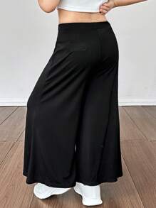 SHEIN Pantalones casuales sueltos y de un solo color de punto para niña
