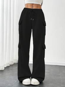 Flirla Pantalon gris décontracté pour femmes à taille basse, avec cordon de serrage, sangles, poches cargo et jambes larges. Un vêtement de sport minimaliste et pour l'automne.