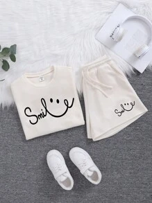 SHEIN Teen Girl Solid Color Ribbed Knit Round Neck Short Sleeve T-Shirt & Graphic Print Shorts Set, Casual Everyday Wear