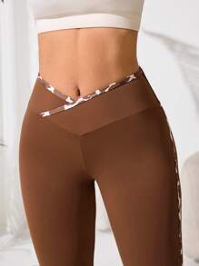 Easithlete Women Asymmetrical Waist Flared Sporty Pants - Brown - View 5