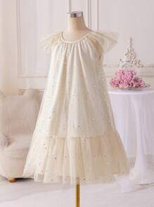 Glamorique Kids Vestido de princesa con estampado de estrellas y lunas para niña preadolescente, adecuado para festivales, reuniones familiares y salidas casuales. El diseño único con estampado de estrellas y lunas y la falda voluminosa de tul hacen que este vestido sea a la vez soñador y juguetón.
